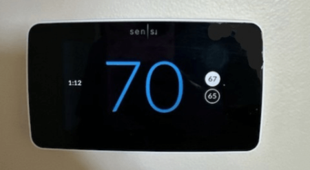 A thermostat displaying the temperature of 70 degrees. We’ve Been Installing HVAC Systems in Athens MI Since 1974. Call (269) 965-1627 to schedule service.